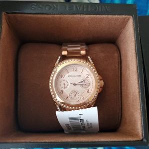 MK rose gold watch